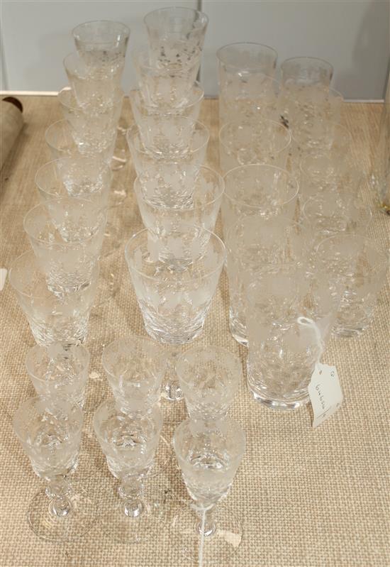 An Edinburgh crystal sixty three piece suite of drinking glasses and a matching decanter and stopper, 20th century